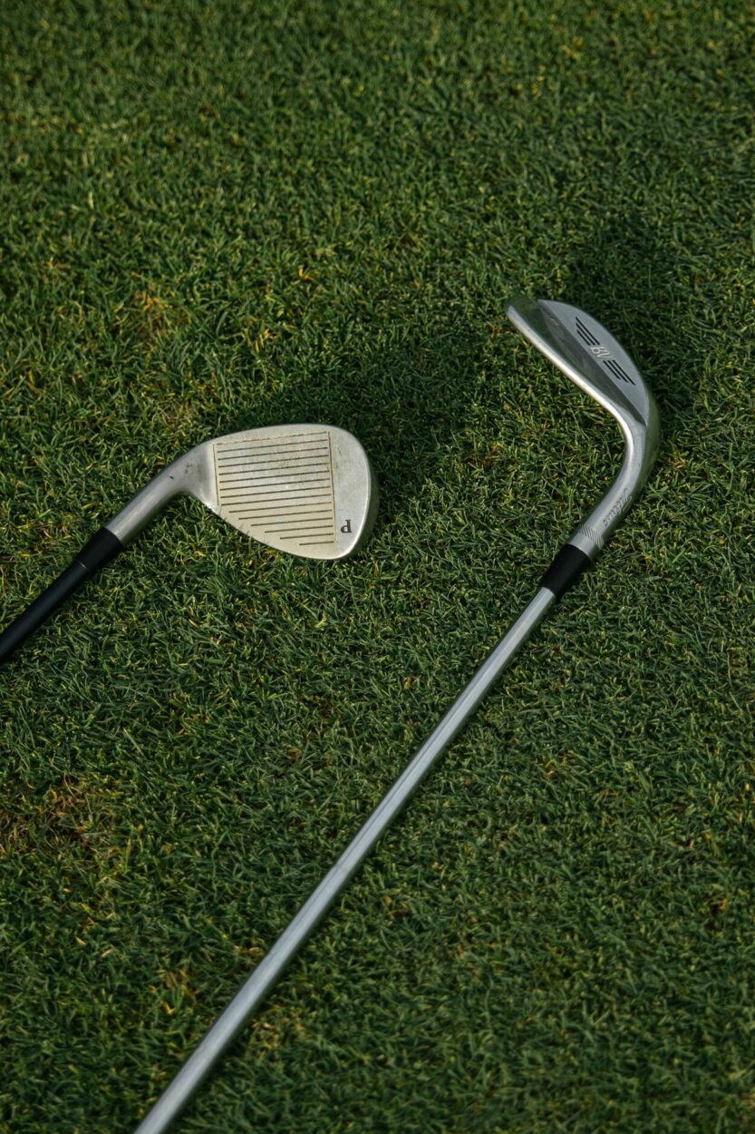 Two golf clubs with iron.